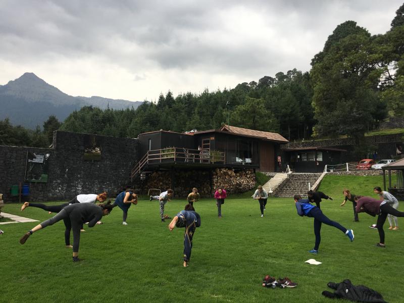 Practicing yoga at IWMF HEFAT training