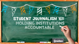 Chalk board that with the article title written on it.